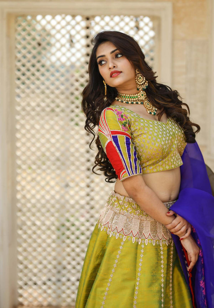 Green with applique work Bridal Lehenga